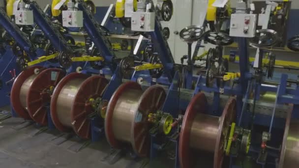 Closeup Camera Moves Factory Department Shows Machines Reeling Threads Bobbins — Stock Video