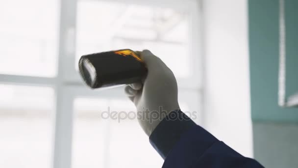 Closeup Lab Assistant White Rubber Gloves Shakes Glass Bottle Natural — Stock Video