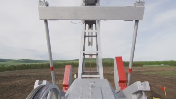 Closeup Large Wheel Belt Rotates Makes Moving Pump Jack Machine — Stock Video