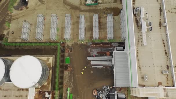 Ispettori a piedi per il futuro centro commerciale bird eye view — Video Stock