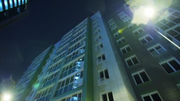 Apartment complex with new buildings at cold winter night — 图库视频影像