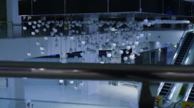 testing beautiful construction with lamps and colors in mall