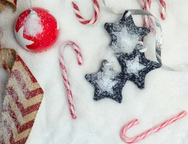 Christmas ornaments on snow — Stock Photo, Image
