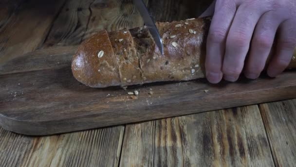Closeup View Chef Cuts Bread Slices Wooden Cutting Board — 图库视频影像