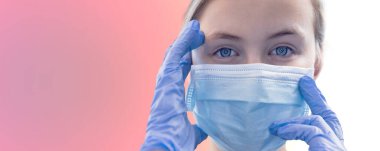 Caucasian Girl wearing protection face mask and blue nitrile surgical gloves against coronavirus. Banner panorama medical staff preventive gear clipart
