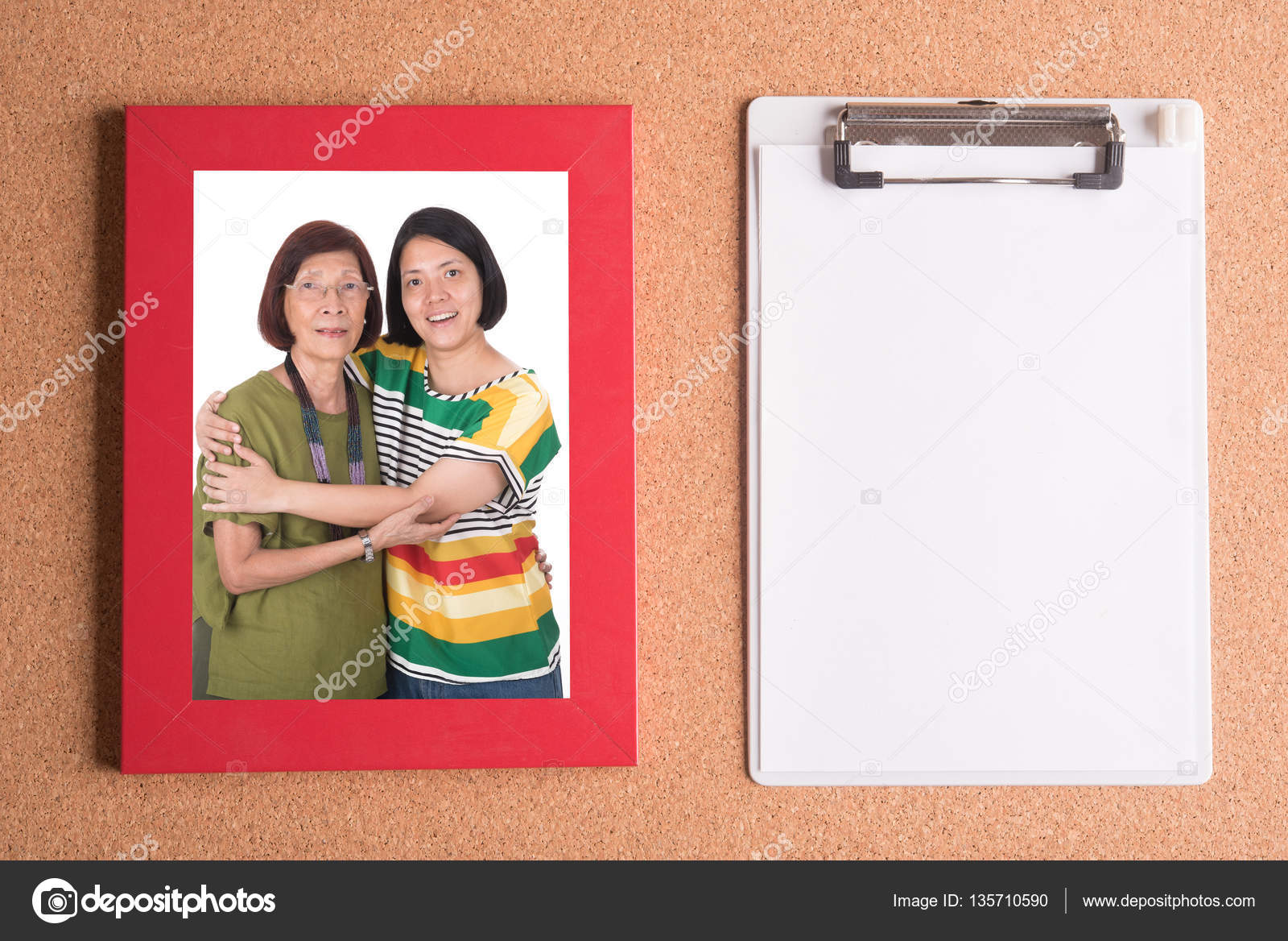 Clipboard And Frame With Picture Of Mom Daughter On