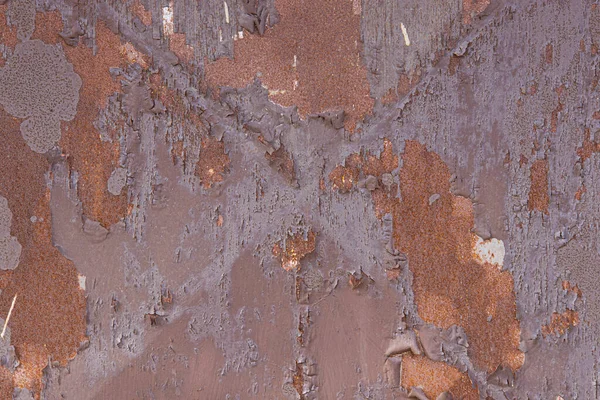 An old, rusty, colored plate with traces of background painting — Stockfoto