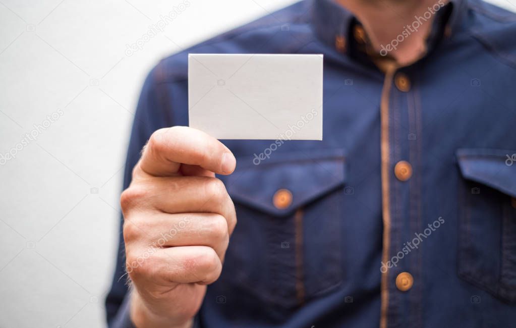 Bank card, business card, businessman holds card in hand, financ