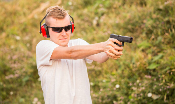 Handsome and young blond policeman professional army special for