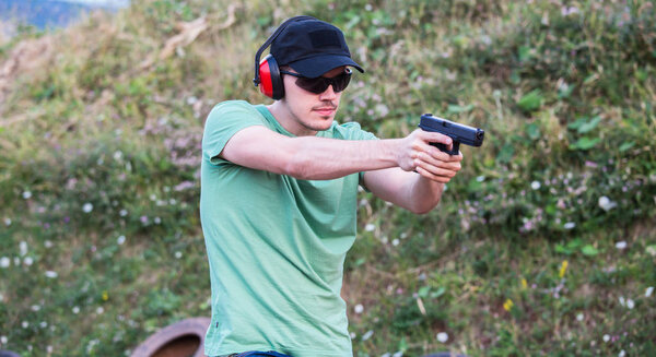 Policeman professional army special force training field aiming 