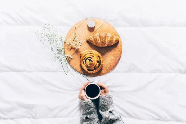 croissant and bun with raisins