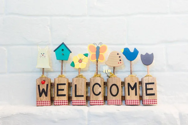 Welcome text on the wall background and copy space — Stock Photo, Image