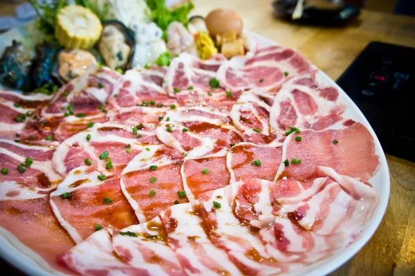 Meat sliced in Shabu restaurant — Stock Photo, Image