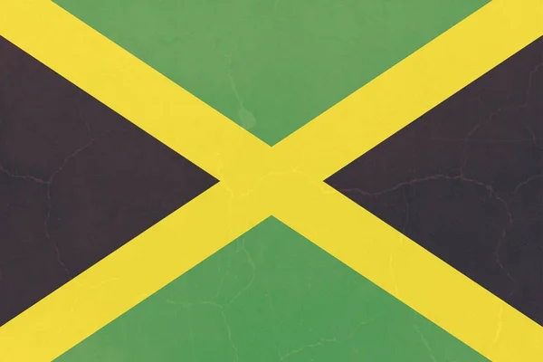 Jamaica flag  on cracked concrete — Stock Photo, Image