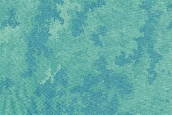 Blue grunge camouflage cloth background