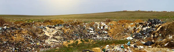Garbage dump in the field - panorama