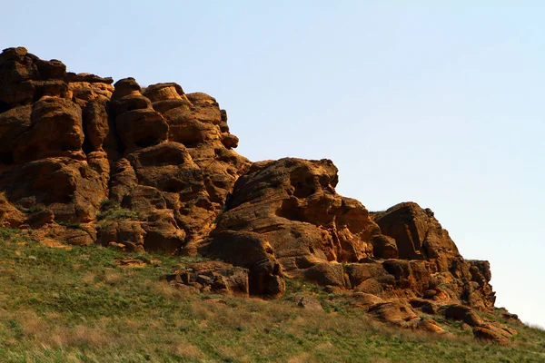 Weathered eroded stones on the hill slope — Stock Photo, Image