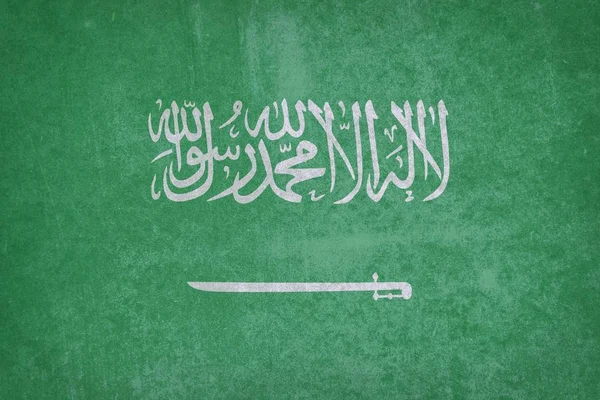 Alte saudi-arabische Fahne auf Stein — Stockfoto