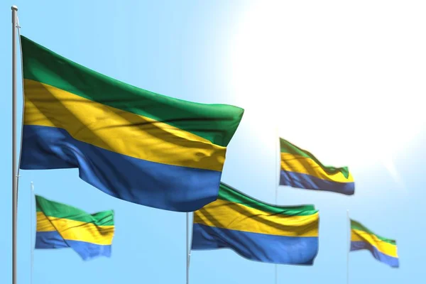 Agradable 5 banderas de Gabón son ola contra la imagen del cielo azul con enfoque suave - cualquier ilustración 3d bandera de vacaciones — Foto de Stock