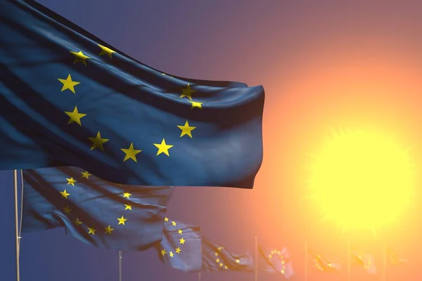 nice many European Union flags on sunset placed diagonal with soft focus and space for your text - any celebration flag 3d illustration