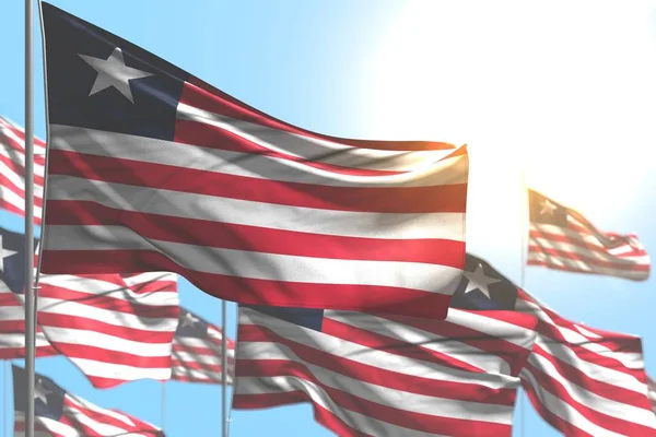 Meraviglioso molte bandiere della Liberia sono onda contro immagine cielo blu con messa a fuoco selettiva - qualsiasi occasione bandiera 3d illustrazione — Foto Stock