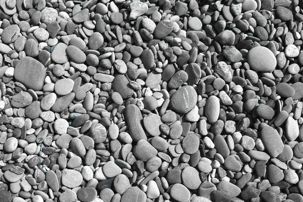Droge rivieroever steentjes textuur - mooie abstracte foto achtergrond — Stockfoto