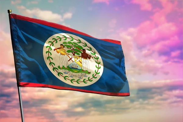 Fluttering Belize flag on colorful cloudy sky background. Prosperity concept. — Stock Photo, Image