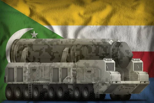 Mezikontinentální balistická střela s městskou kamufláží na pozadí komorské národní vlajky. 3D ilustrace — Stock fotografie