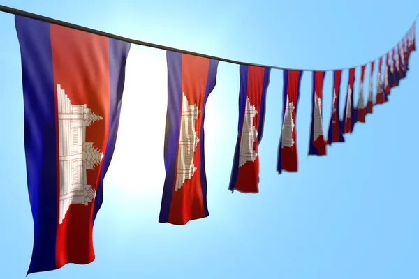 Muitas bandeiras ou banners Camboja pendura diagonal na corda no fundo do céu azul com foco seletivo - qualquer bandeira celebração ilustração 3d — Fotografia de Stock