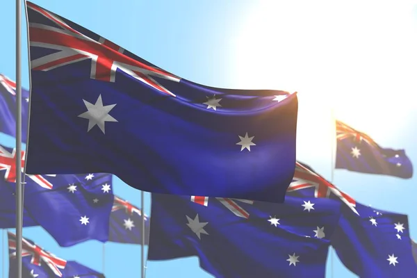 Belle beaucoup de drapeaux de l'Australie sont vagues contre l'image du ciel bleu avec mise au point sélective - tout drapeau de vacances illustration 3d — Photo