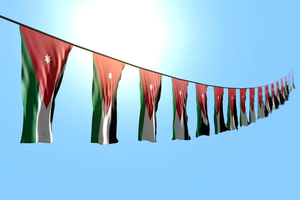 Söt många Jordan flaggor eller banderoller hänger diagonalt på sträng på blå himmel bakgrund med selektivt fokus - någon firande flagga 3D-illustration — Stockfoto