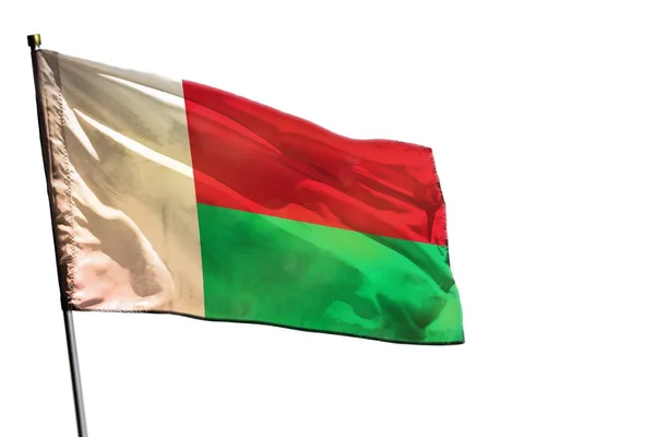 Sventolando bandiera Madagascar su sfondo bianco chiaro isolato . — Foto Stock