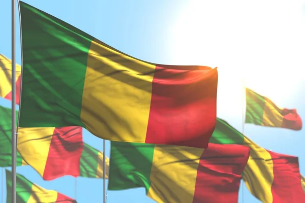 Birçok güzel Mali bayrakları mavi gökyüzü resmine karşı yumuşak odaklı dalgalanıyor - herhangi bir olay 3D illüstrasyon — Stok fotoğraf