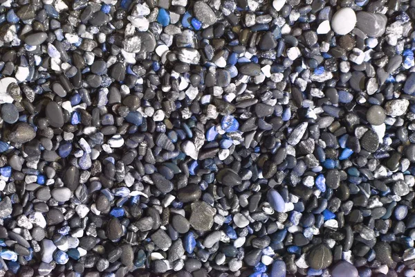 Глянцеві океанічні камені, мокрі за допомогою водної текстури - досить абстрактний фото фон — стокове фото