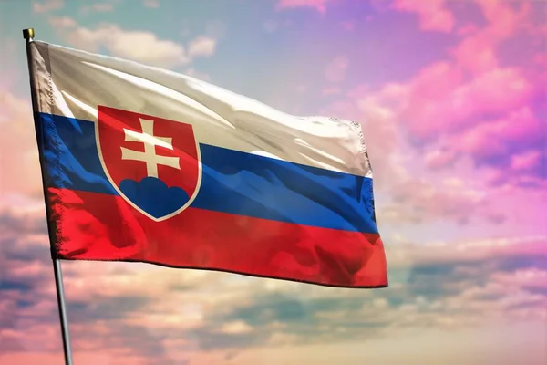 Fluttering Slovakia flag on colorful cloudy sky background. Prosperity concept. — Stock Photo, Image