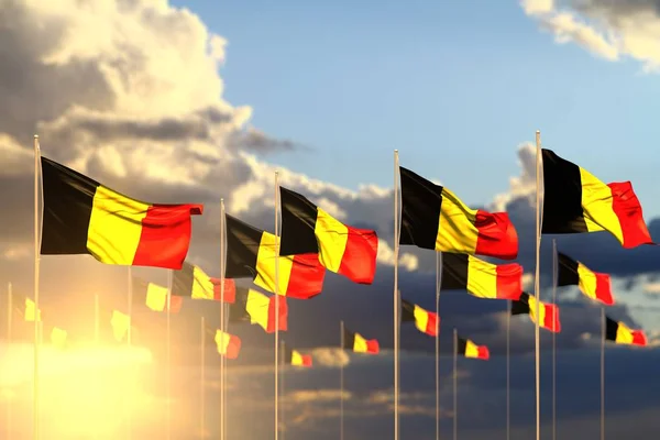 Lindo muchas banderas de Bélgica en la puesta del sol colocado en fila con bokeh y espacio para el contenido - cualquier ocasión bandera 3d ilustración — Foto de Stock