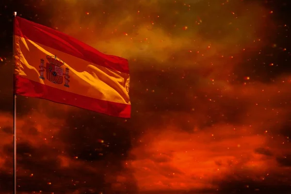 Fluttering Spain flag mockup with blank space for your text on crimson red sky with smoke pillars background. Troubles concept. — 스톡 사진