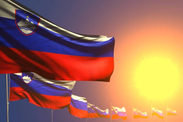 Mignon de nombreux drapeaux Slovénie sur coucher de soleil placé en diagonale avec mise au point douce et place pour le texte - toute occasion drapeau illustration 3d — Photo