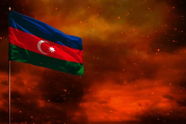 Fluttering Azerbaijan flag mockup with blank space for your text on crimson red sky with smoke pillars background. Troubles concept.