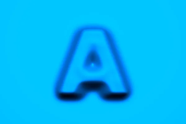 Синий Мягкий Воск Пластиковый Шрифт Буква Изолированный Светло Голубом Фоне — стоковое фото