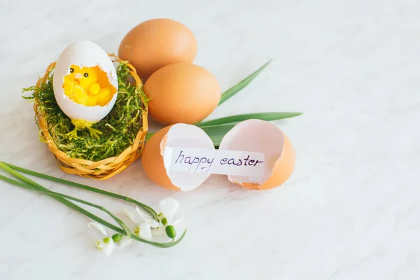 Broken eggshel with happy easter greeting card