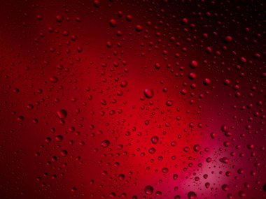 Renk arka plan yağmur cam alanı rainbow su damlaları.