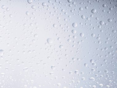 Renk arka plan yağmur cam alanı rainbow su damlaları.