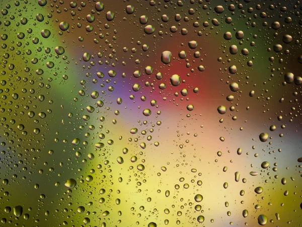 Wasser Tropfen Farbe Hintergrund Regen Glas Raum Regenbogen. — Stockfoto