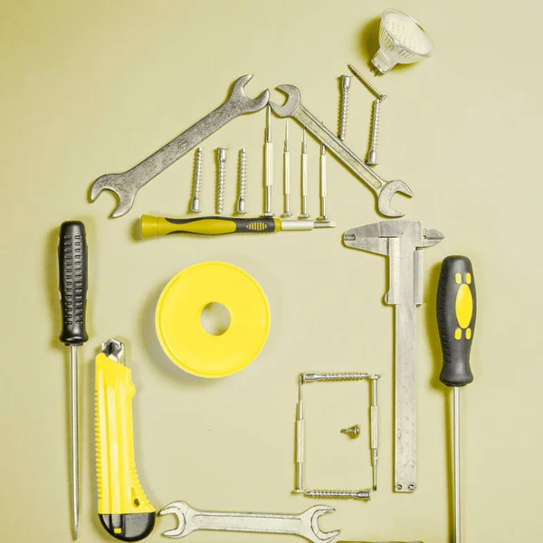 Koncepce domácí zlepšení. Nastavit pracovní nástroj ručička pro výstavbu nebo opravu domu — Stock fotografie