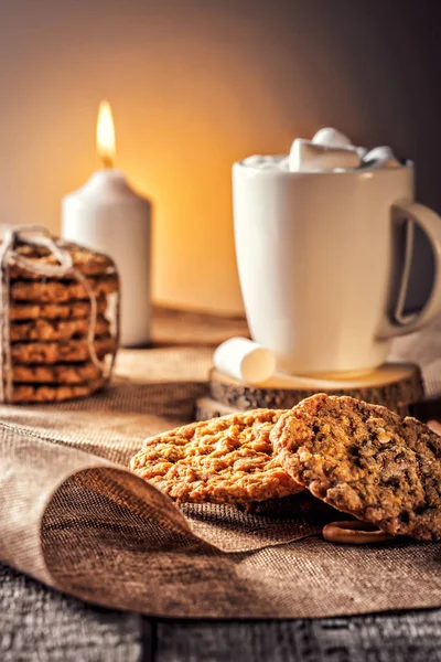 Winter autumn still life  homemade recipe honey ginger oatmeal cookie and bagel, cocoa cup coffee with marshmallow on wooden table kitchen — Stock Photo, Image