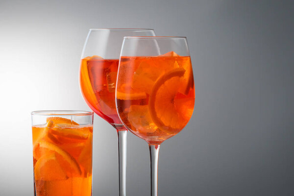 Summer refreshing faintly alcoholic cocktail Aperol spritz in a 