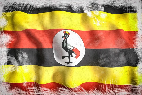 Uganda zászlót lengetve — Stock Fotó