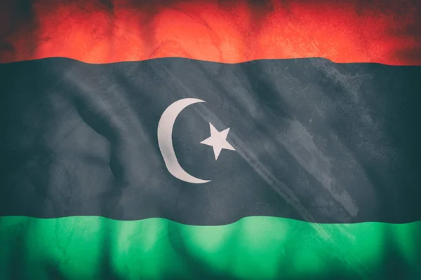 3D-Darstellung einer alten libyschen Flagge, die weht — Stockfoto
