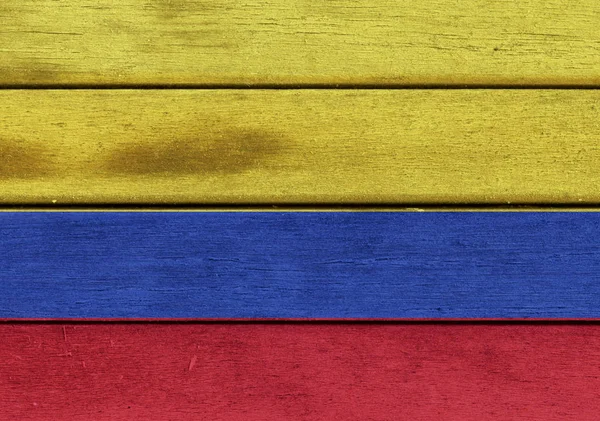 Colombia flag on a wood — Stock Photo, Image